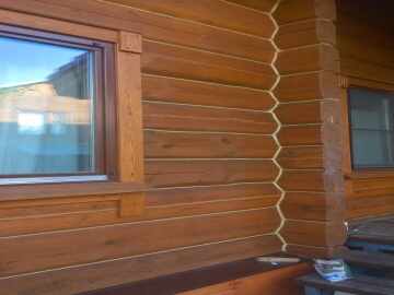 Герметизация швов деревянного дома фрагмент работы в Витебске